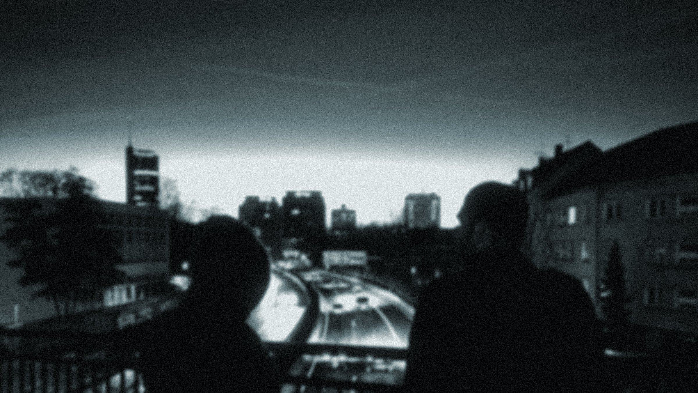 Night sky over the A40 motorway, Scot & Millfield as silhouettes on a bridge